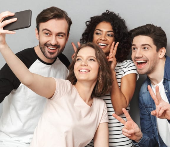 Group of young adults taking a selfie