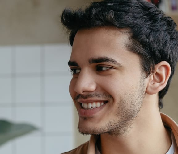 Man and woman looking at each other and smiling