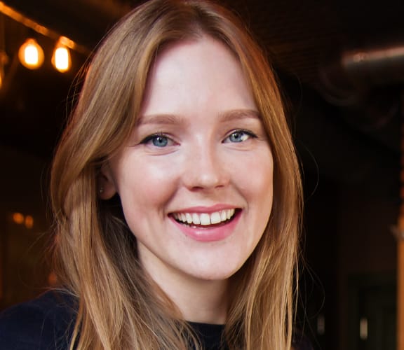 Young woman sitting at a cafe